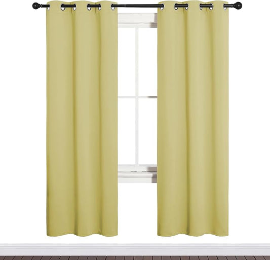 NICETOWN Bedroom Curtain Panels Blackout Draperies, Thermal Insulated Solid Grommet Blackout Curtains/Drapes (Paler Yellow, 1 Pair, 34 by 72-inch)