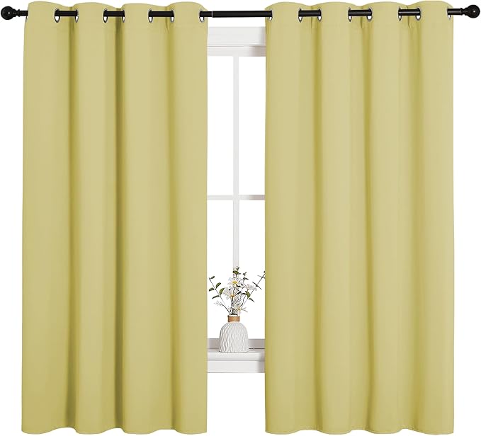 NICETOWN Bedroom Curtain Panels Blackout Draperies, Thermal Insulated Solid Grommet Blackout Curtains/Drapes (Paler Yellow, 1 Pair, 55 by 68-inch)