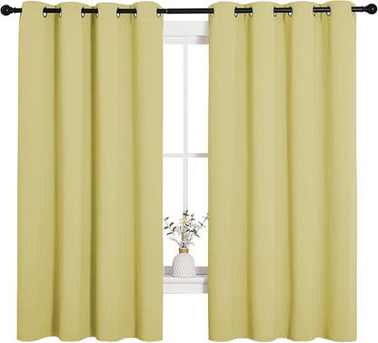 NICETOWN Bedroom Curtain Panels Blackout Draperies, Thermal Insulated Solid Grommet Blackout Curtains/Drapes (Paler Yellow, 1 Pair, 55 by 68-inch)