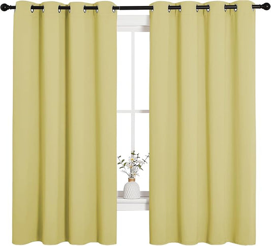 NICETOWN Bedroom Curtain Panels Blackout Draperies, Thermal Insulated Solid Grommet Blackout Curtains/Drapes (Paler Yellow, 1 Pair, 55 by 68-inch)