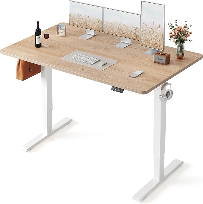 FEZIBO Electric Standing Desk, 55 × 28 Inches Height Adjustable, Sit and Stand Up, Home Office Computer Desk (Maple)
