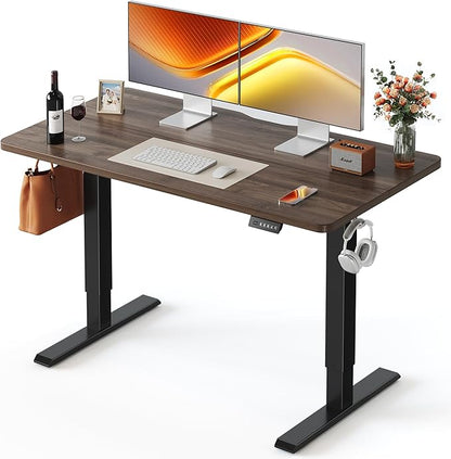 FEZIBO 55 x 24 Inchs Electric Standing Desk, Height Adjustable, Sit Stand Up, Computer Office Desk with Splice Board, Black Frame/Black Walnut Top
