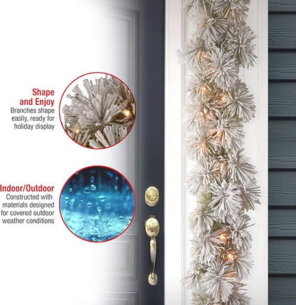 National Tree Company 9 ft Pre-Lit Snowy Bristle Pine Artificial Christmas Garland, Christmas Decoration with 70 Clear Lights, 75 Tips, Green
