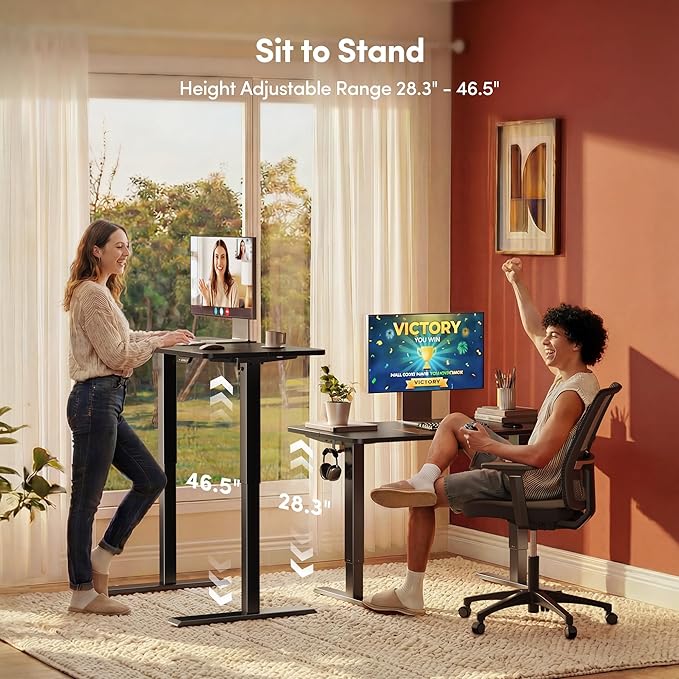 FEZIBO Standing Desk, 63×28 Inches Electric Height Adjustable, Sit Stand Up, Computer Office Desk with Splice Board, Black Frame/Black TOP