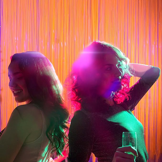 Glow in The Dark Party Supplies, 2 Pack Macaron Orange Foil Fringe Curtains, 3.3 x 6.6 ft Blacklight Reactive Fluorescent Tinsel Backdrop Neon Luminous Streamers for Birthday Photo Booth Prop