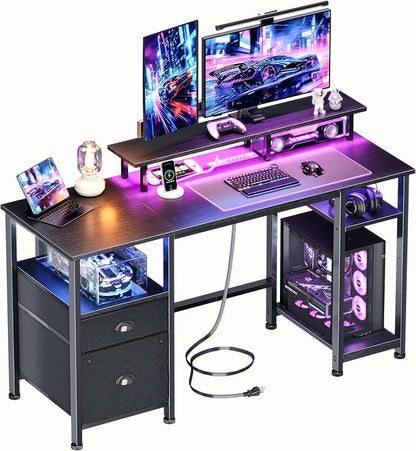 Furologee 51" Gaming Desk with Power Outlets & LED Lights, Reversible Computer Desk with File Cabinet & Monitor Stand for Home Office, Large Work Table with Storage Shelves & Drawer, Black